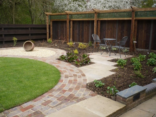Shaped Brick Pathway and Staggered Indian Sandstone Patio